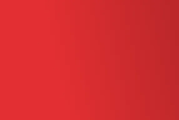 A plain, vibrant red background with no visible objects or patterns.